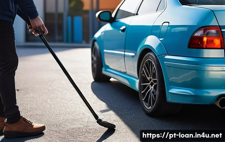 리스 차량 반납 절차 - A high-resolution image of a modern rental car parked in a well-lit urban parking lot, showing a det...